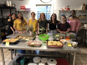 A taste of home: REU students give back