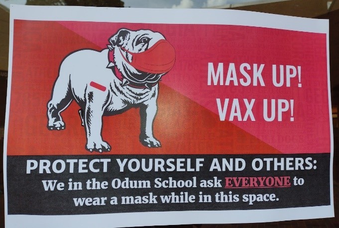 Poster with an image of a masked bulldog and the message "Mask up! Vax up! Protect yourself and others: We in the Odum School ask EVERYONE to wear a mask while in this space."